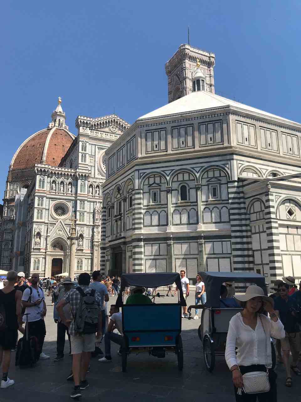Duomo from street full of people