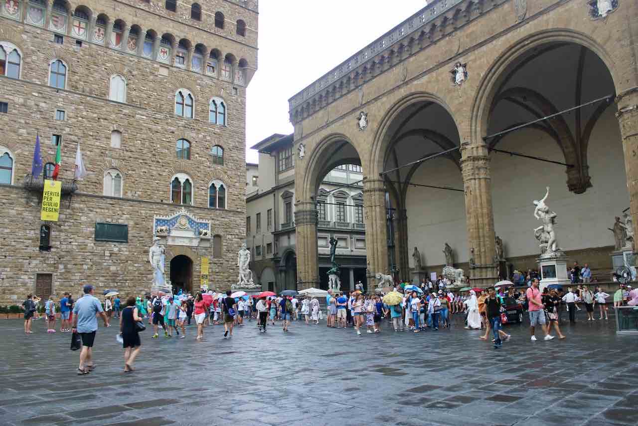 piazza signoria with crowd of people