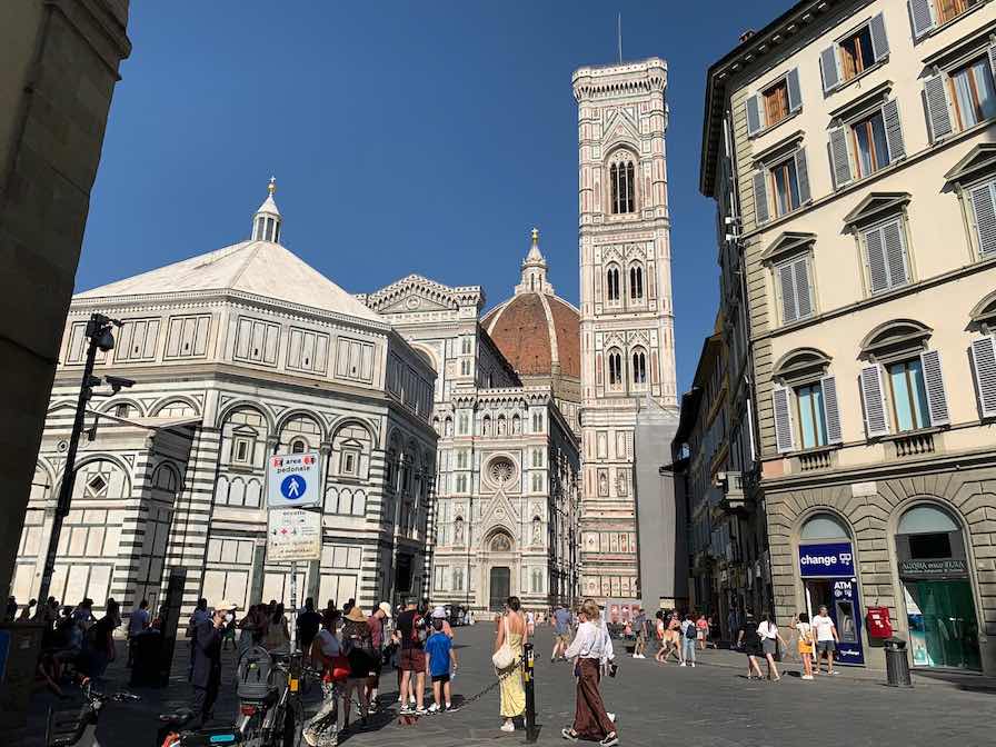View on Duomo from the street full of people