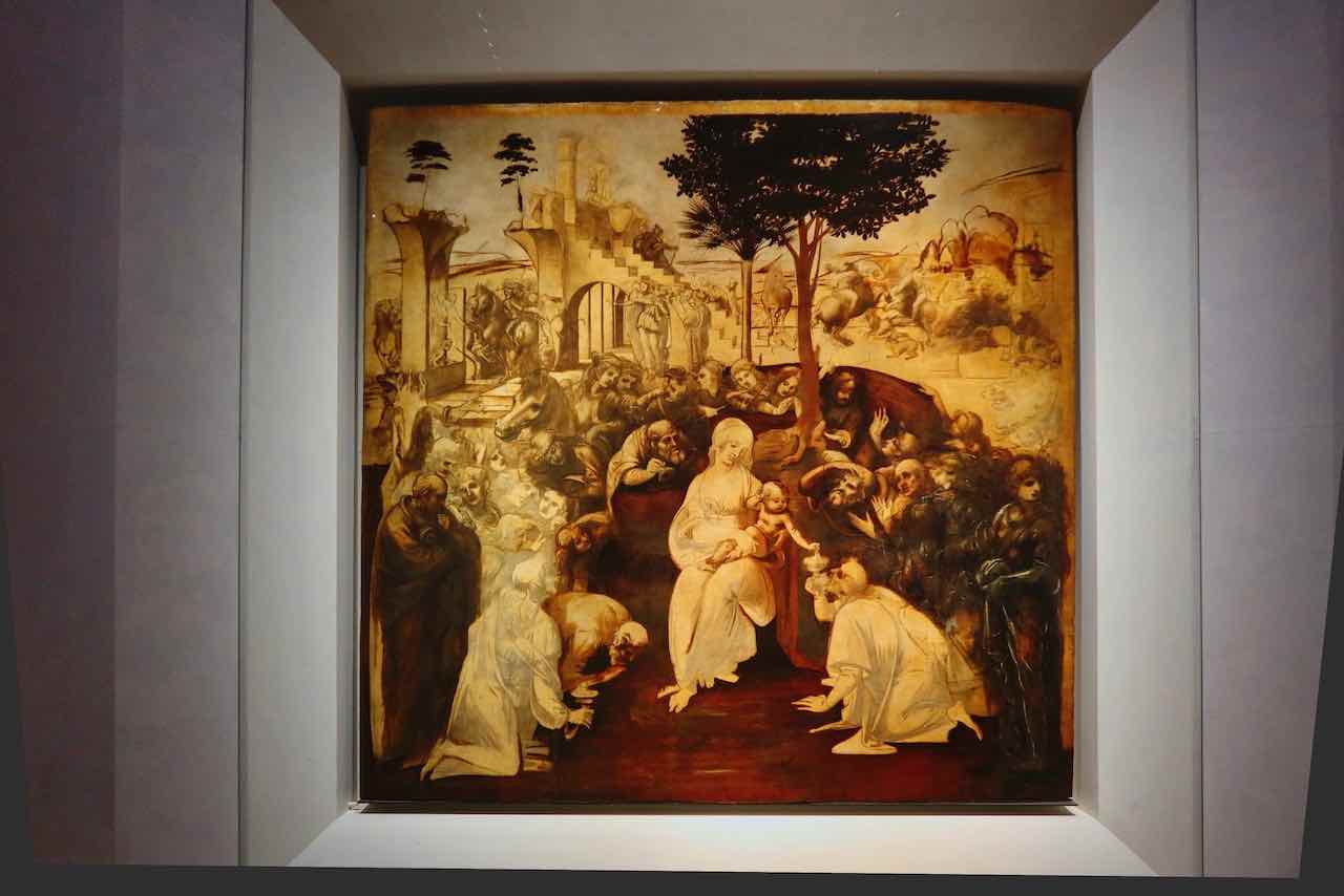 Painting Adoration of the Magi by Leonardo da Vinci in the Uffizi Gallery
