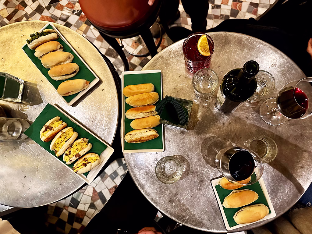 Procacci Aperitivo table top down view of glasses and plates